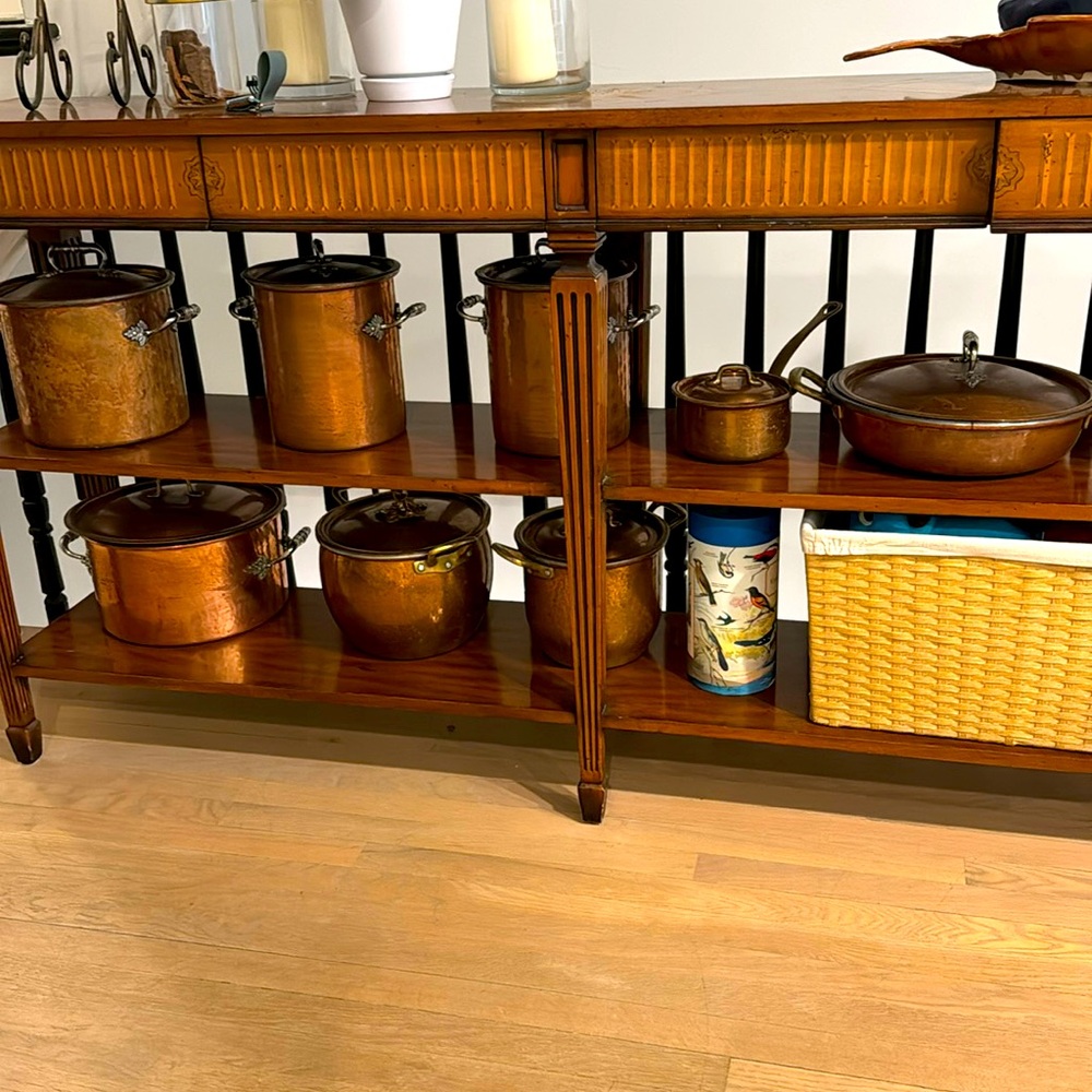 8 copper pots. Absolutely beautiful set that I have enjoyed for many years.